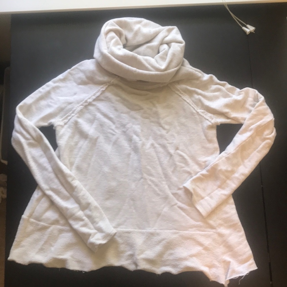Stylish cream color sweater from boutique